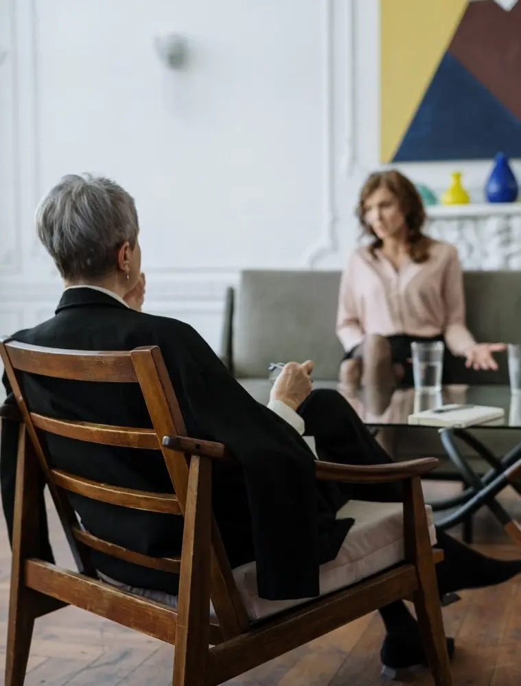 Therapist Listening to Client During Therapy Session